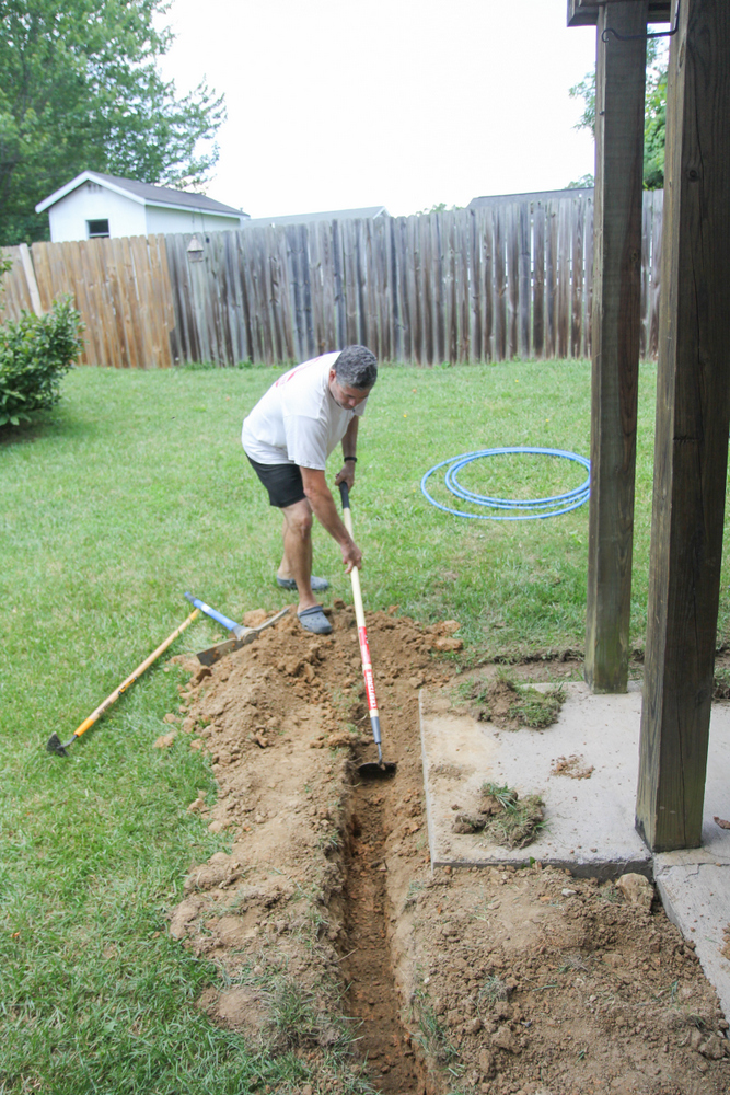 digging trench for irrigation tubing