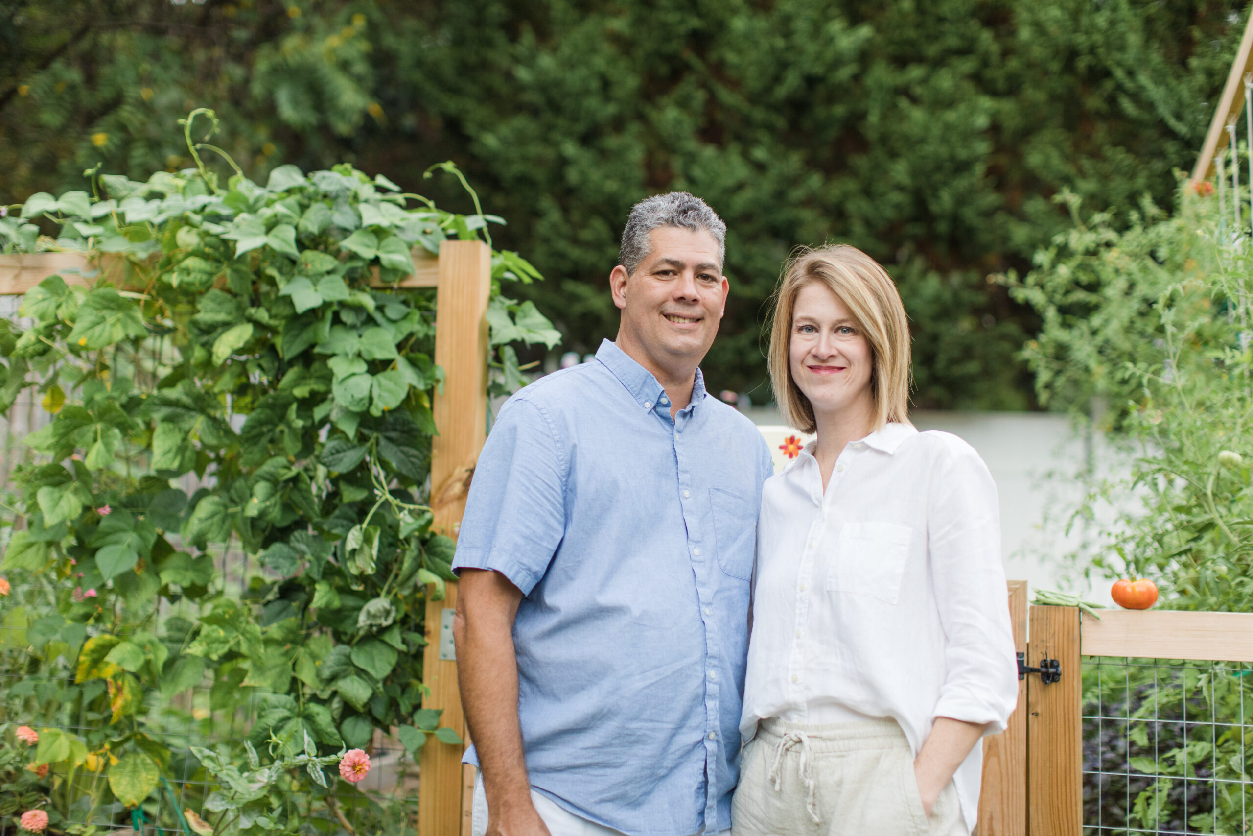 Whitney and her husband in the garden